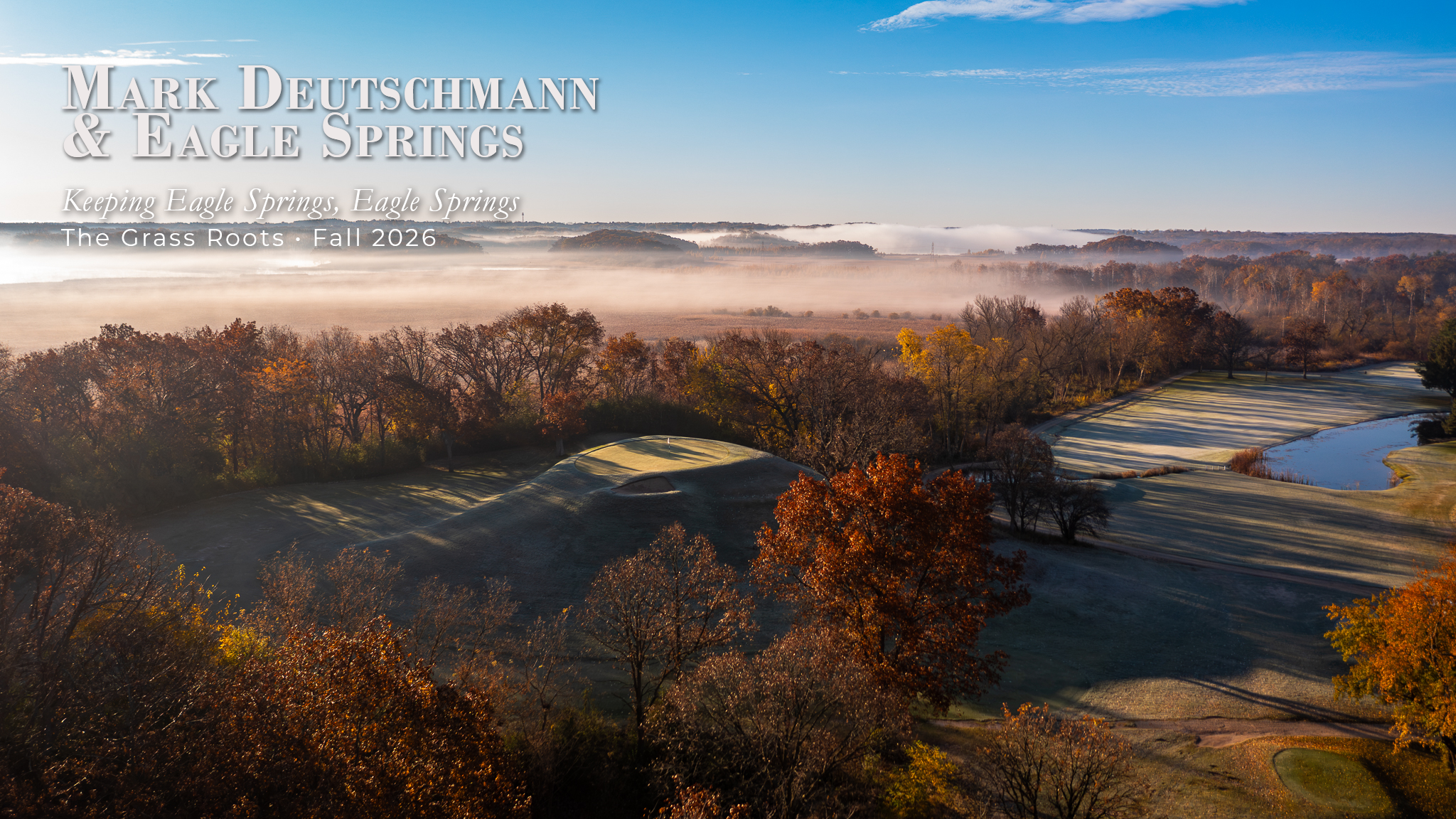 Aerial view of Eagle Springs Golf Resort in Wisconsin on a foggy fall morning, featuring the historic golf course and surrounding autumn landscape.